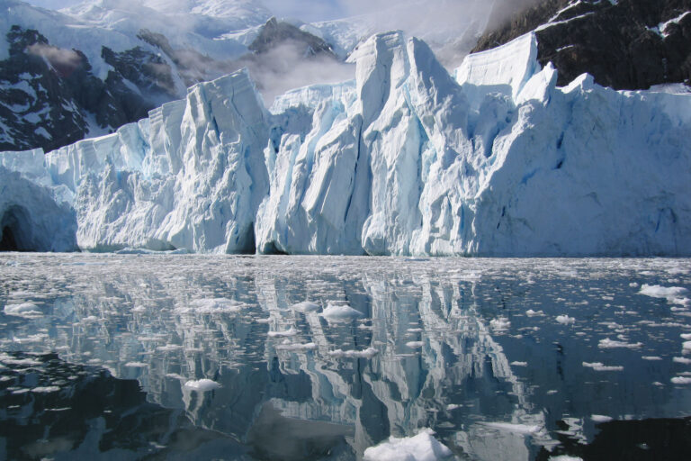 antarctica mountains and iceberg reflection mk