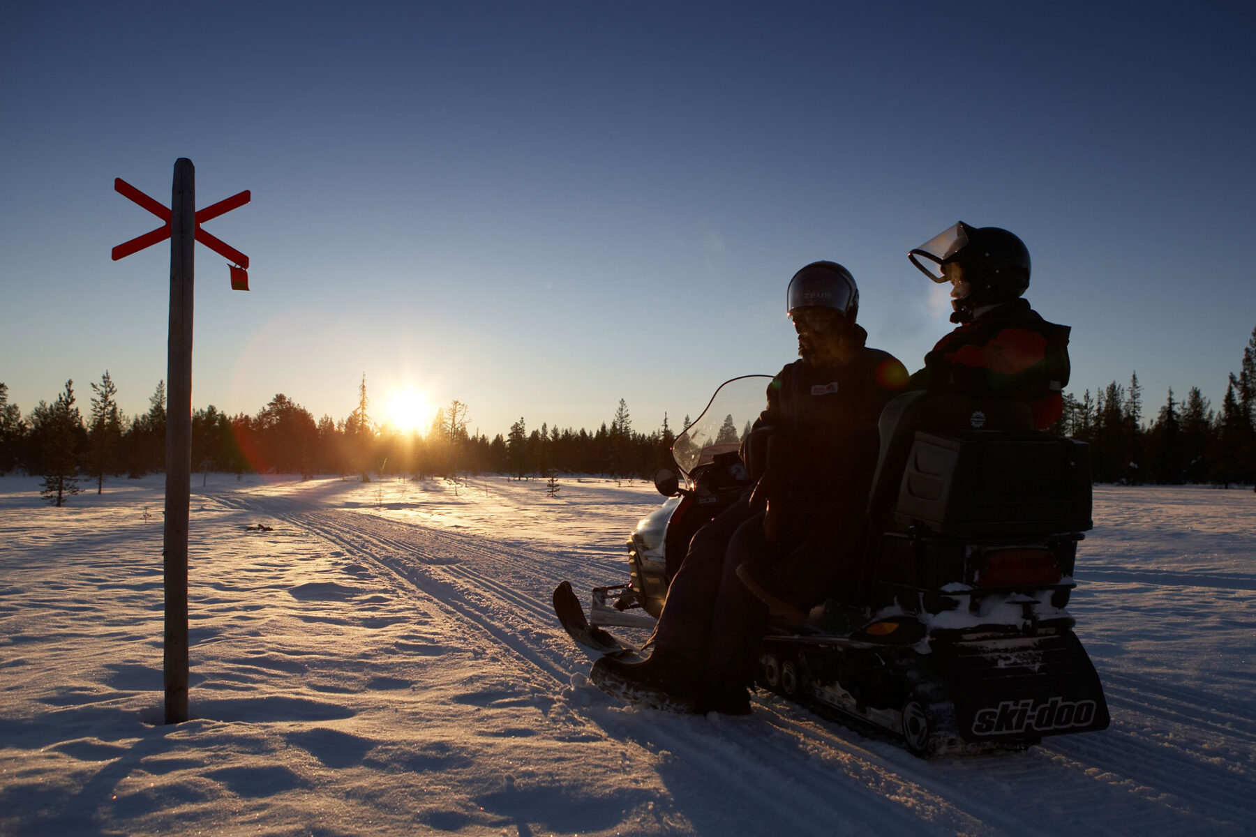 sweden lapland snowmobile dusk rth
