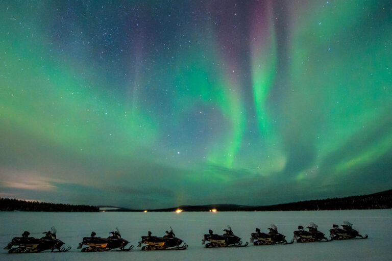 swedish lapland icehotel northern lights by snowmobile