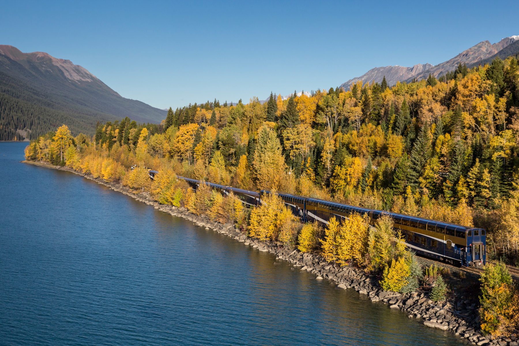 Rocky Mountaineer train through fall foliage