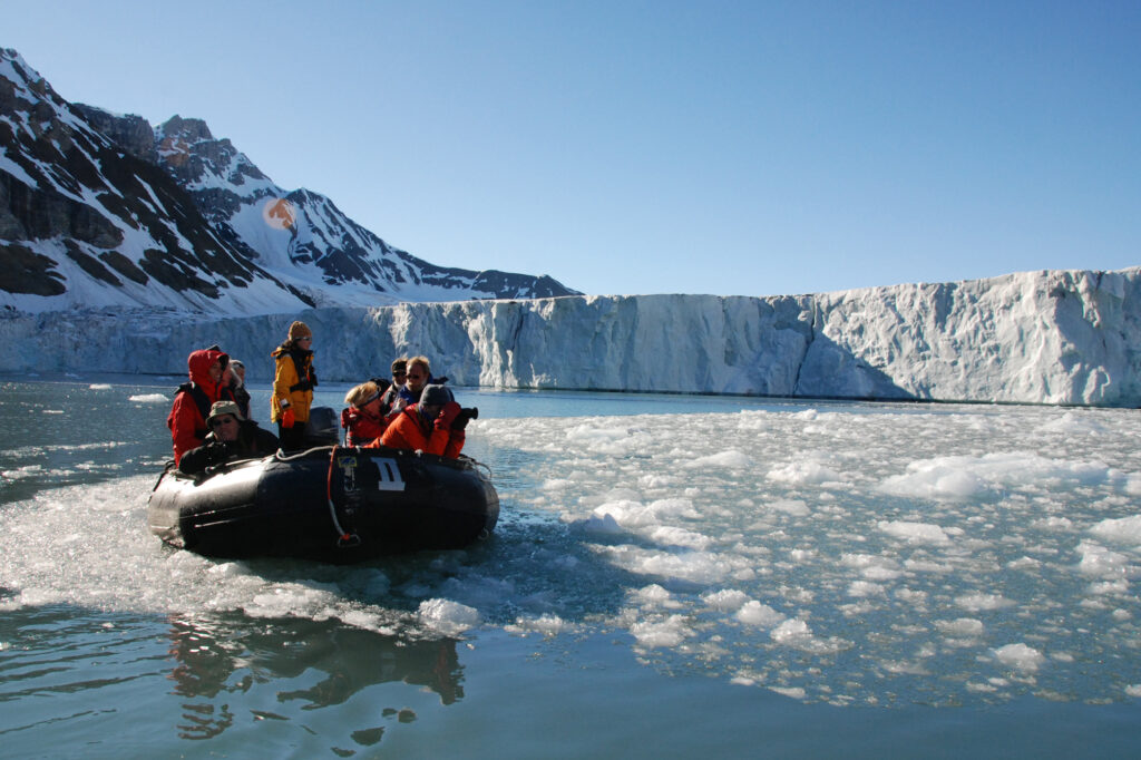 arctic spitsbergen zodiac group at glacier front rp