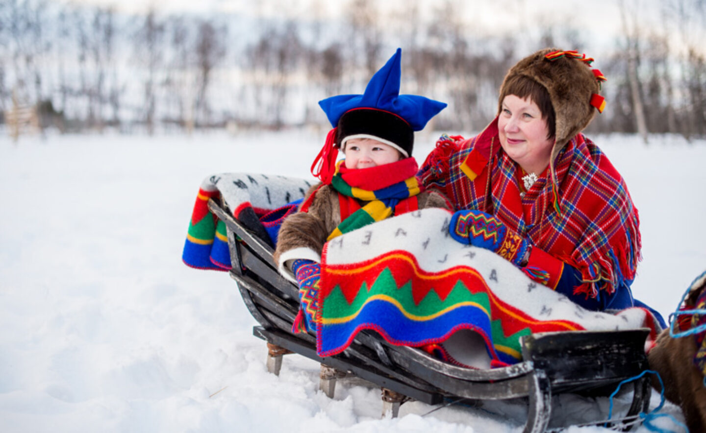 northern norway sami mother and child in traditional dress nn