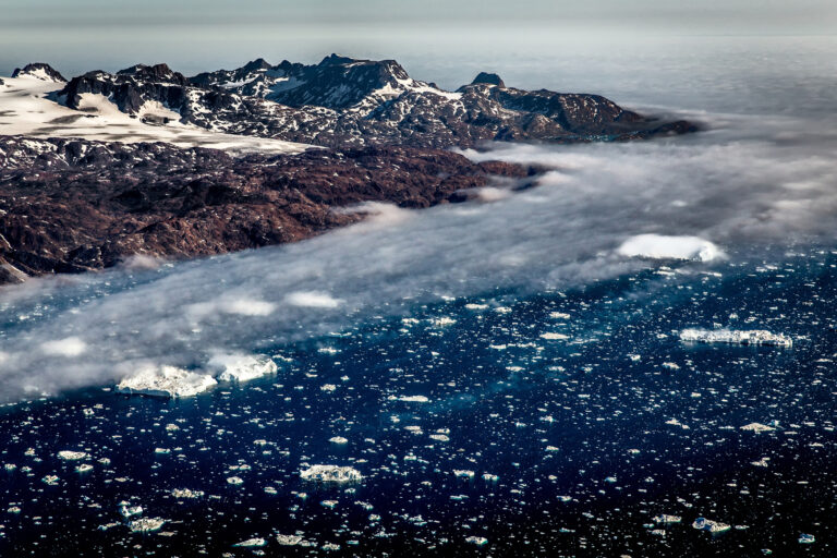 east greenland sermilik ice fjord partially covered in fog vg
