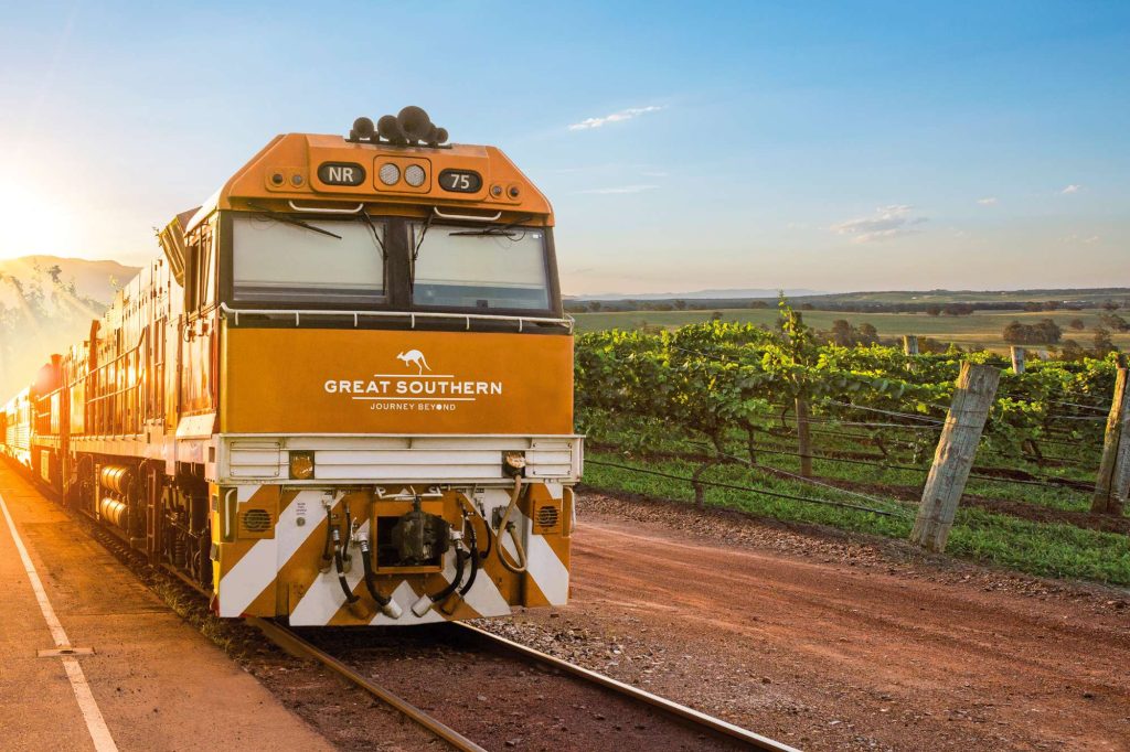 australia great southern rail train passing vineyards artist impression