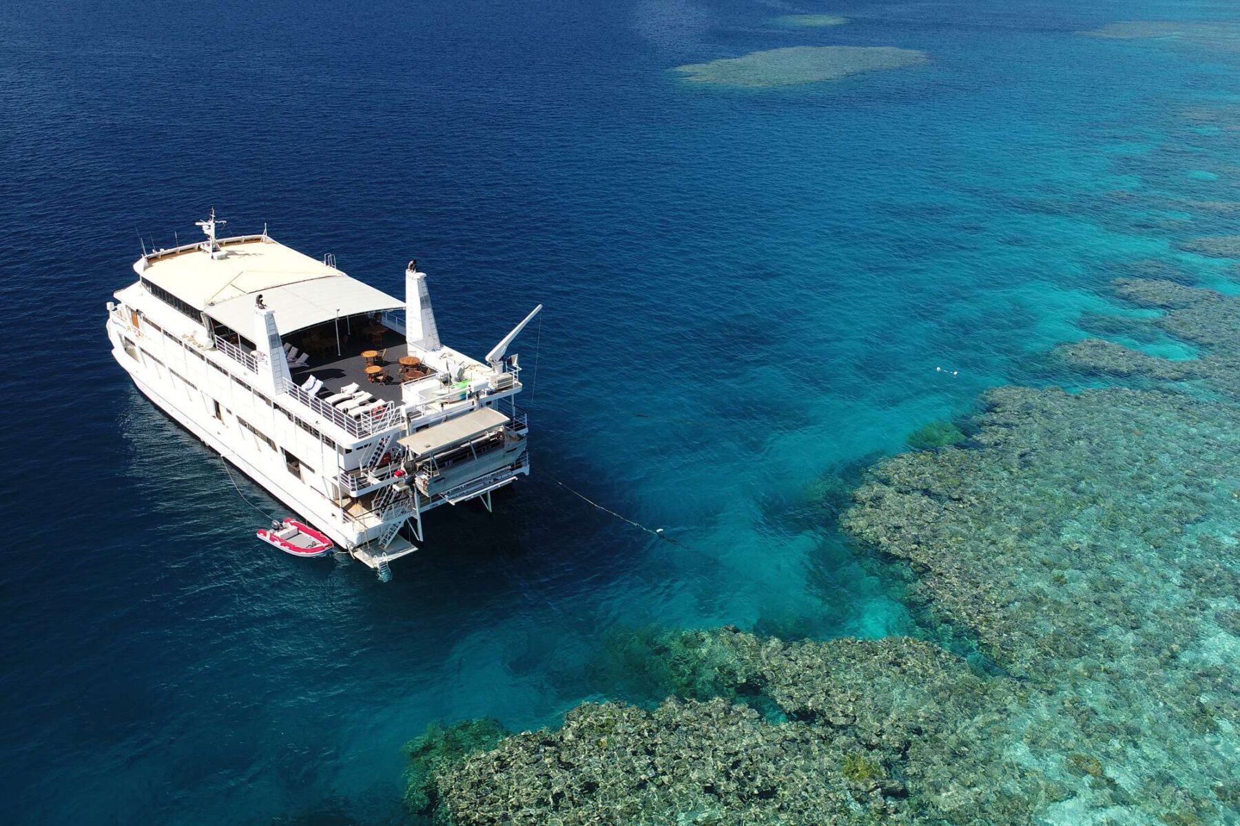 coral expeditions II ship and reef aerial view