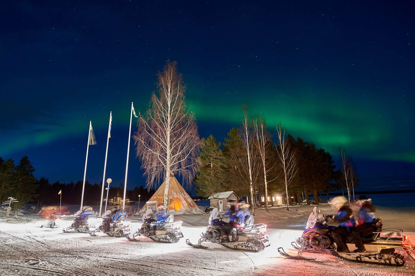swedish lapland brandon lodge snowmobile train with aurora gr