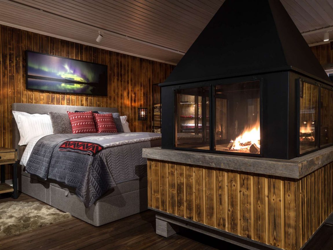 swedish lapland loggers lodge interior bed and fire ll
