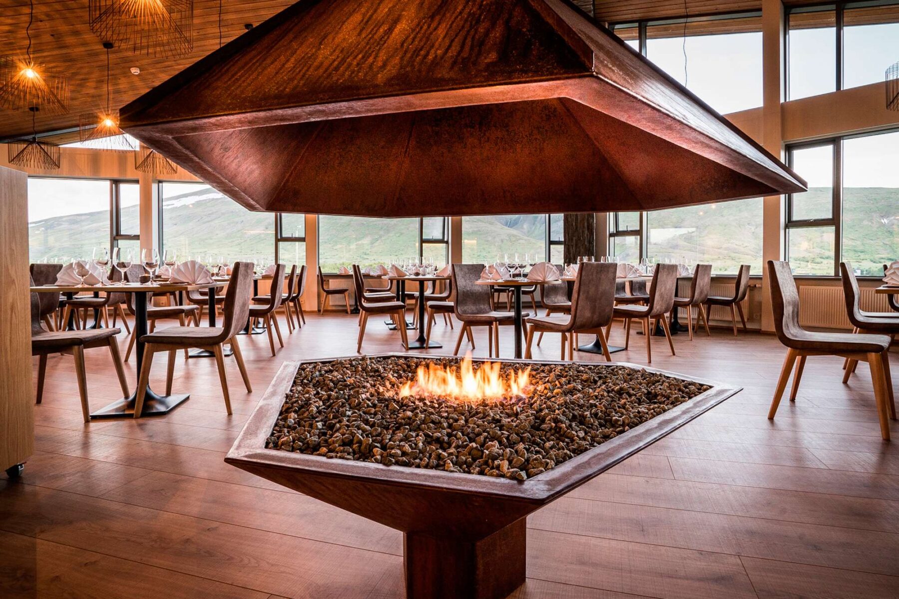 west hotel husafell dining area restaurant fire feature