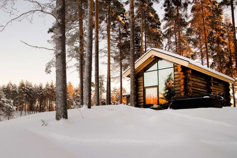 swedish lapland arctic retreat cabin at sunset