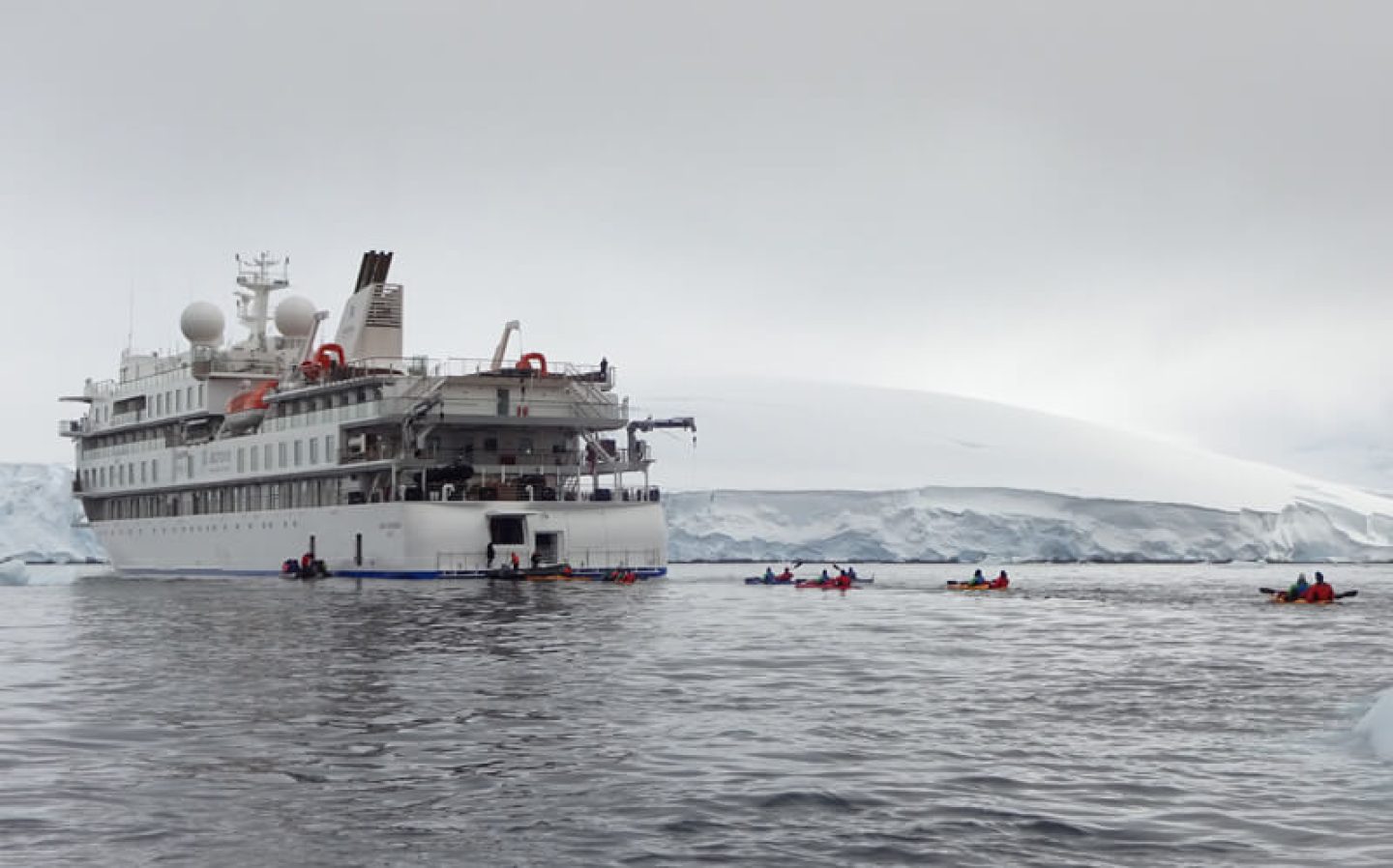 greg mortimer with kayaks in antarctica cp