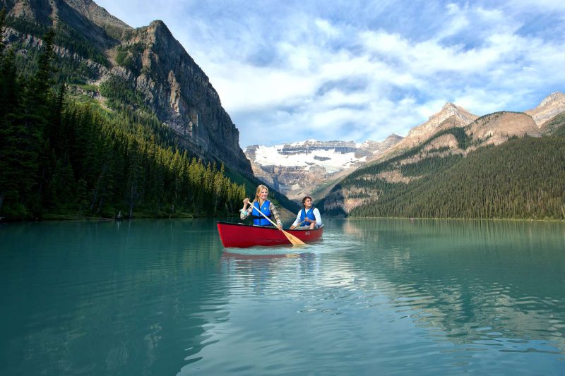 alberta fairmont chateau lake louise hotel canoeing couple