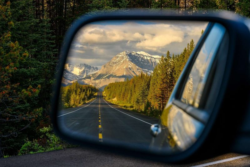 Wing mirror view of the Icefields Parkway
