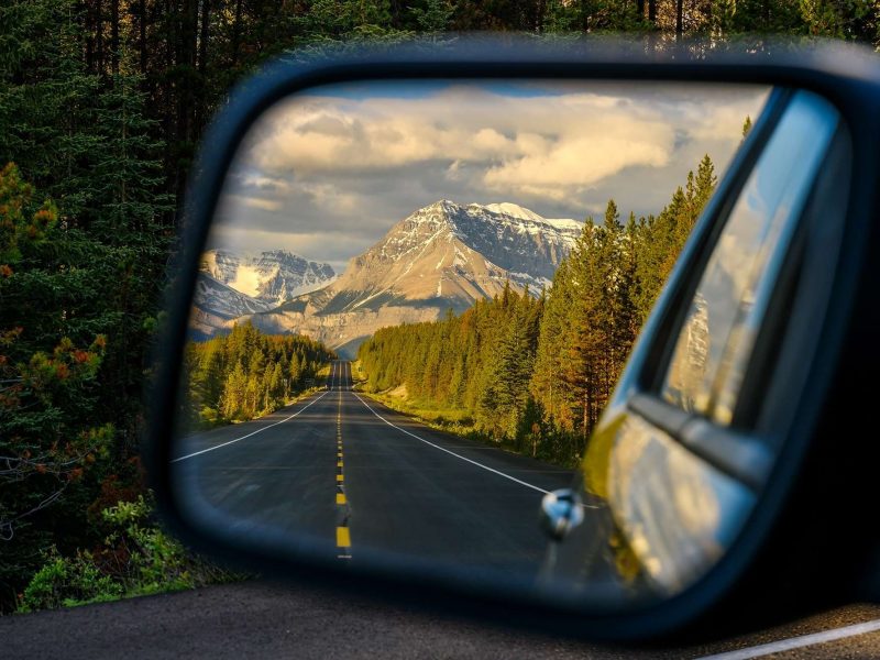 Wing mirror view of the Icefields Parkway