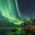 northern norway northern lights over fjord tromso doll