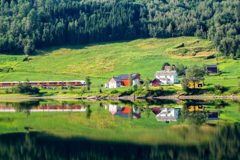 fjord norway train passing lake vangvatnet istk