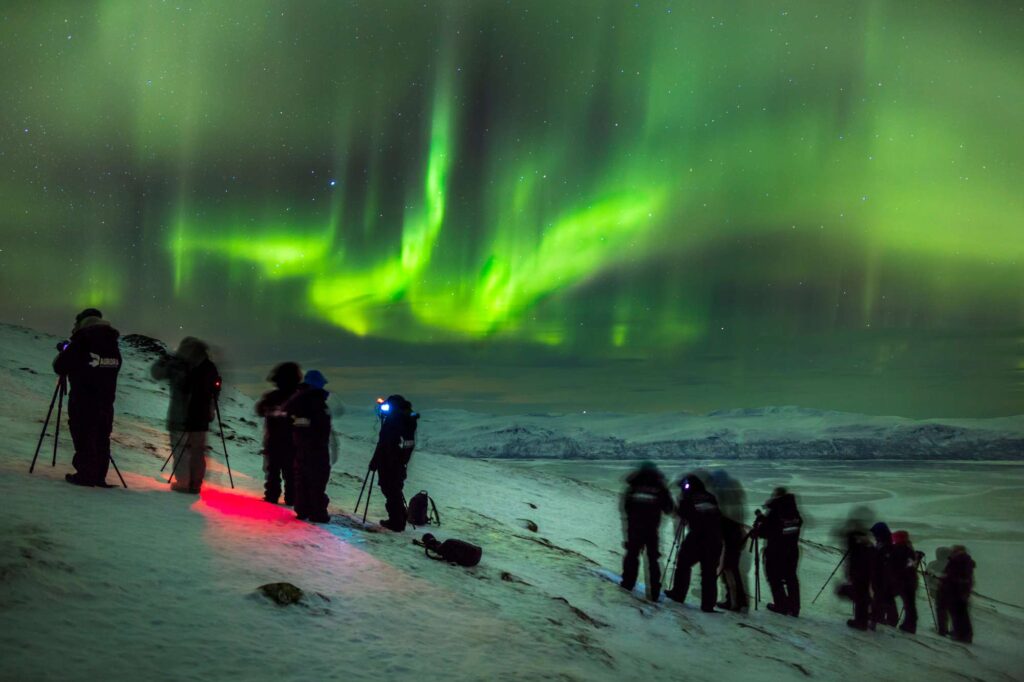 swedish lapland photographers watching aurora at abisko national park rth