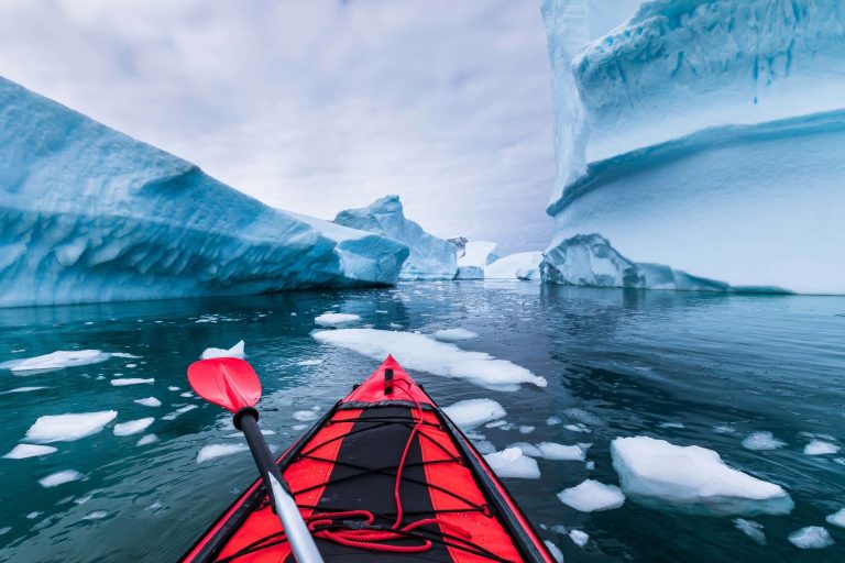 antarctic peninsula kayaking through icebergs pov istk