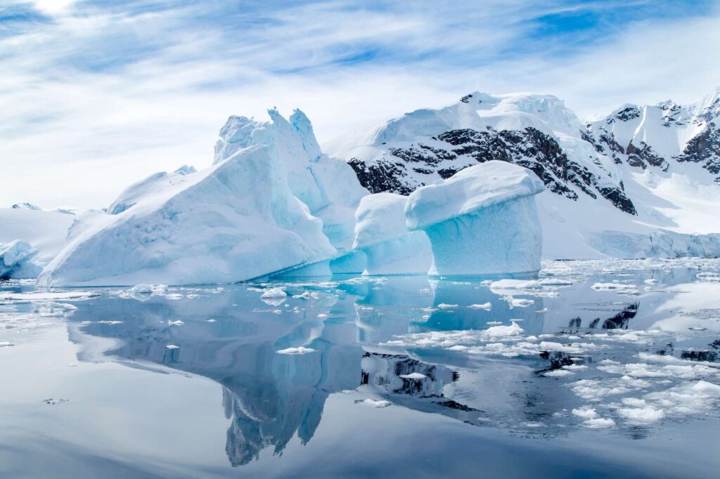 antarctica paradise bay iceberg reflection istk