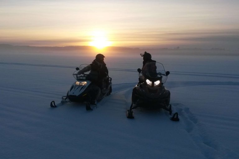 swedish lapland snowmobiling in winter from arctic retreat