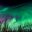 alaska northern lights green and pink colours istk