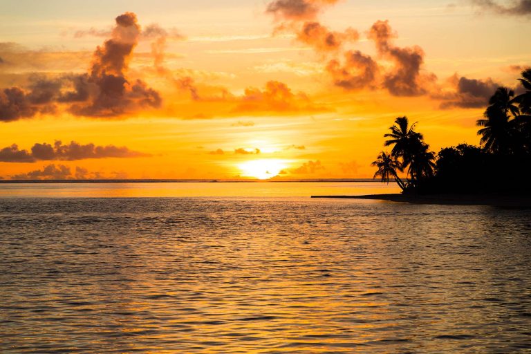french polynesia sunset over water istk