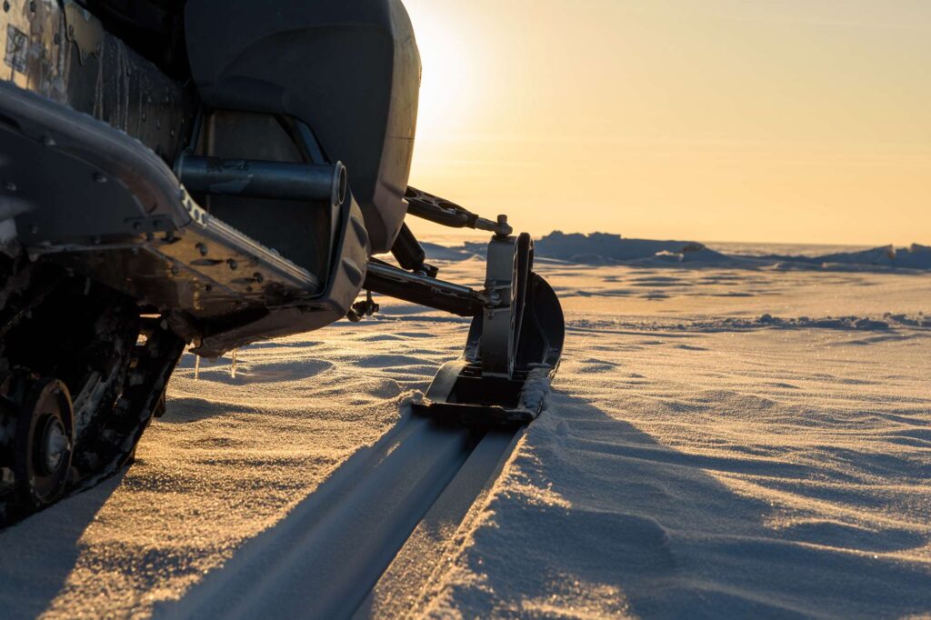 snowmobile at sunset istk