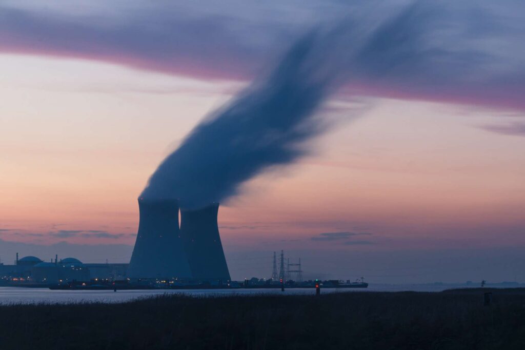 nuclear power plant cooling towers frederic paulussen unsplash