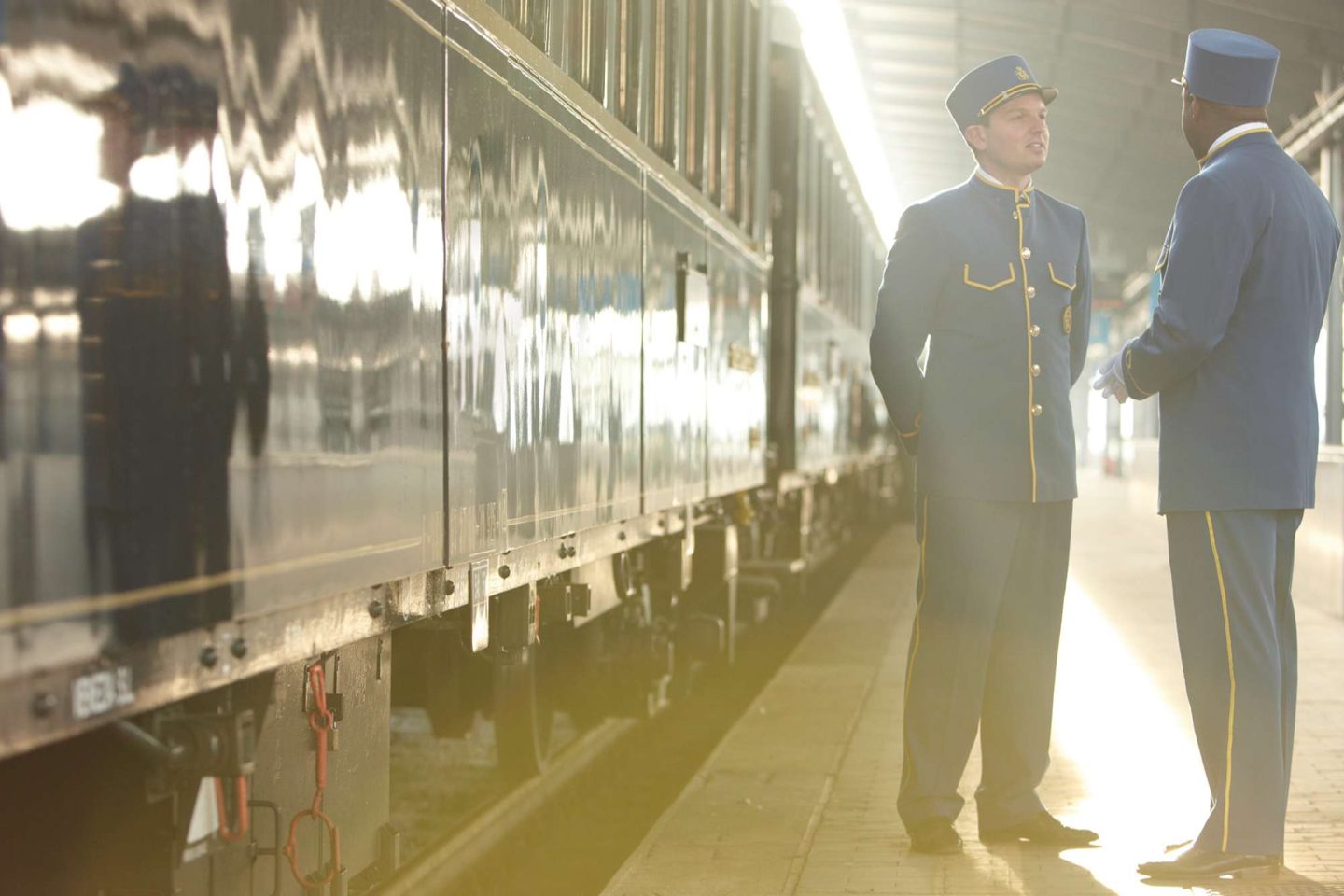 orient express in station train guards