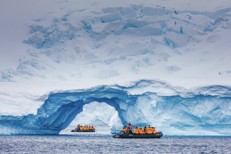 antarctica zodiac cruise past giant icebergs qe