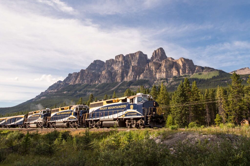 canada rocky mountaineer passing castle mountain rm