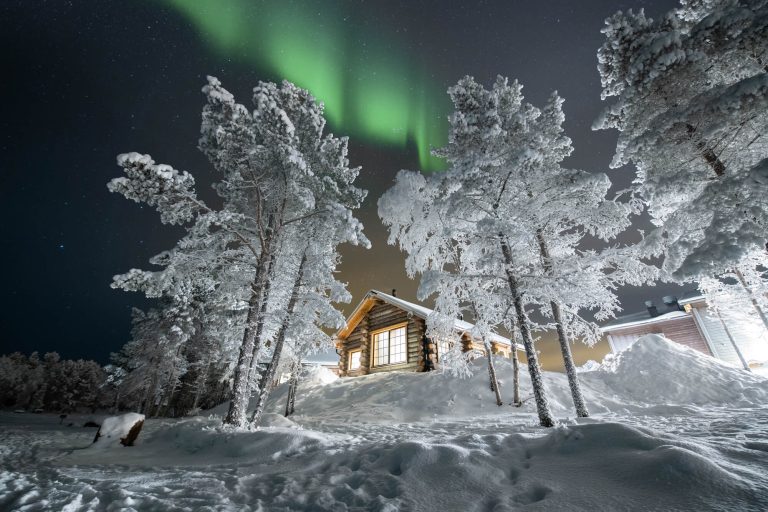 finland aurora over wilderness hotel inari