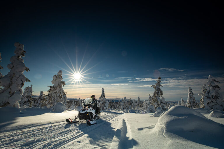 finnish lapland snowmobiling winter sun whs