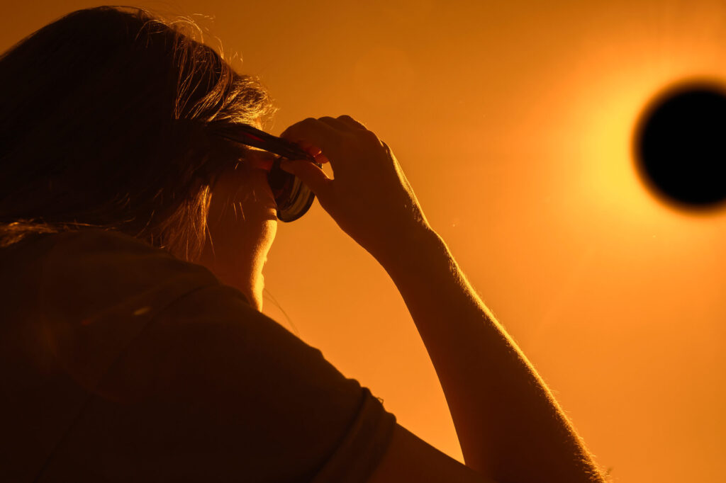 woman-viewing-solar-eclipse-astk