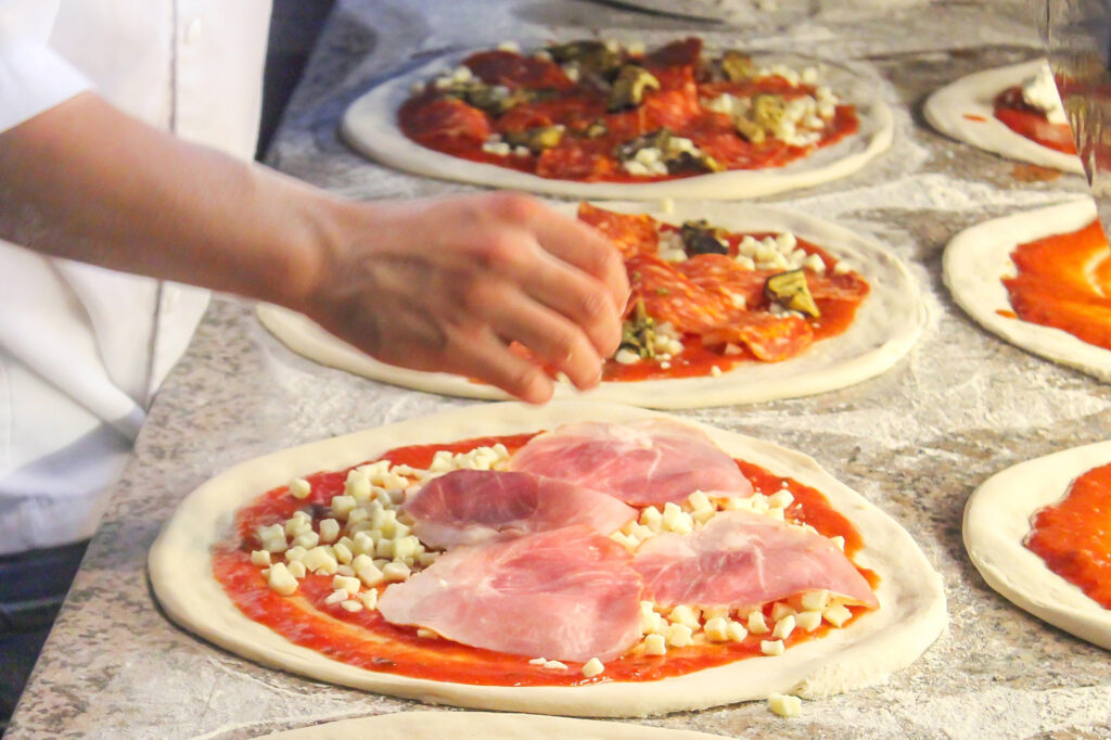 italy preparing pizza istk