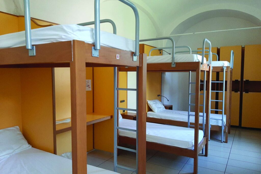 edu italy seven hostel room